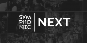 A dark collage of people in social settings forms the backdrop, while the bold white text "Symphonic NEXT" commands attention at the center, evoking anticipation for what's to come.